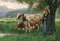 vaches et fille de la campagne